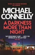 A DARKNESS MORE THAN NIGHT Paperback